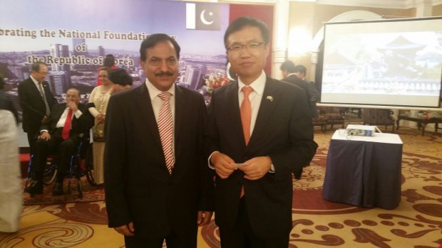 Photograph of Vice President FPCCI Muhammad Waseem Vohra with Korean Consul General, taken at Korean National Day reception.