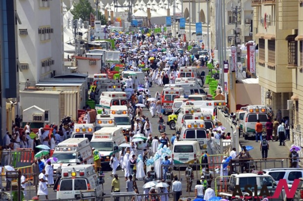 ambulances in Mecca, after people were crushed by overcrowding in Mina, Saudi Arabia during the annual hajj pilgrimage on Thursday, Sept. 24, 2015. Hundreds were killed and injured, Saudi authorities said. The crush happened in Mina, a large valley about five kilometers (three miles) from the holy city of Mecca that has been the site of hajj stampedes in years past. (Saudi Press Agency via AP) 