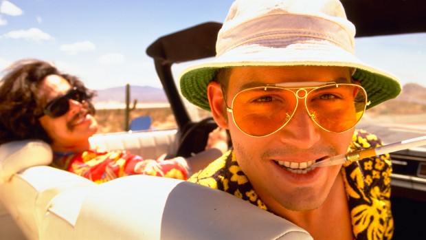 A still shot from the 1998 film, 'Fear and Loathing in Las Vegas' by Terry Gilliam, in which Johnny Depp played Hunter S. Thompson's alter ego, Raoul Duke.  In the back is Benicio Del Toro as Dr. Gonzo. The film was based on Thompson's book of the same name.