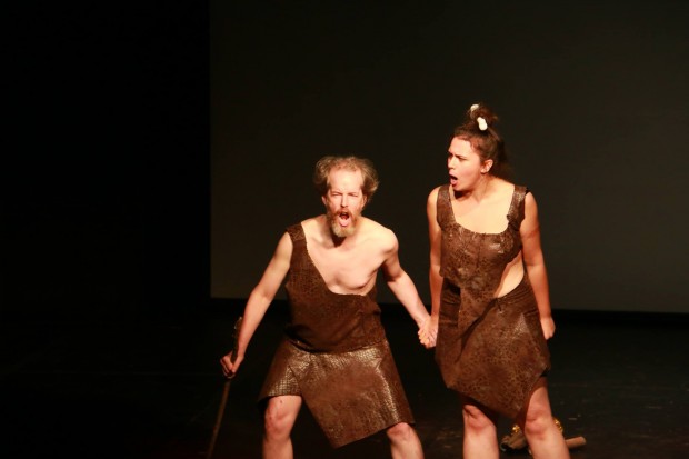 Actors perform in the play "Neanderthal Tech Support," directed by Kate Burney