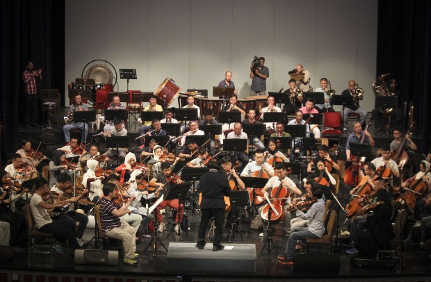 TEHRAN, Aug. 12, 2015 (Xinhua) -- Members of China Philharmonic Orchestra play during a rehearsal in Tehran, Iran, on Aug. 12, 2015. The visiting China Philharmonic Orchestra will jointly perform with Tehran Symphony Orchestra, as part of its six-country silk road tour. (Xinhua/Ahmad Halabisaz) 