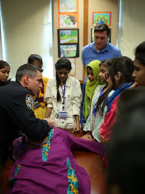 New York Police officers imparting training to the girls in Karachi.
