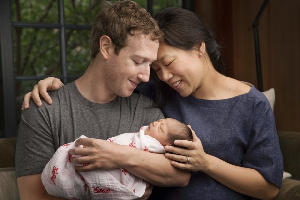 Mark Zuckerberg and wife Priscilla Chan with the newly born daughter, Max Chan Zuckerberg. (Mark Zuckerberg via AP)
