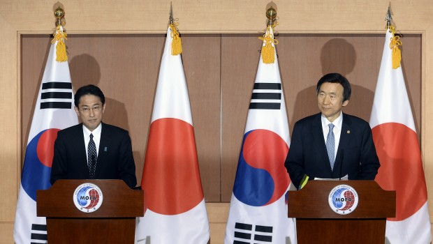 South Korean Foreign Minister Yun Byung-se (R) and his Japanese counterpart Fumio Kishida attend a joint press conference in Seoul, South Korea, Dec. 28, 2015. South Korea and Japan reached a final, irreversible agreement on Japan's wartime sex slavery of Korean women, but complaints remained as Seoul failed to extract Tokyo's acknowledgement of "legal" responsibility for the war crime. (Xinhua/Newsis)