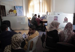 Palestinian employees brainstorm their ideas  (AP Photo/ Khalil Hamra)