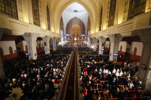 In Egypt, Christians take part in the Coptic Orthodox Christmas Eve mass in St. Mark church in Cairo.(Xinhua/Ahmed Gomaa)