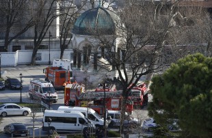 Rescue services vehicles are parked at the site of an explosion in the  historic Sultanahmet district of Istanbul, Tuesday, Jan. 12, 2016. The explosion killed several people and wounded 15 others Tuesday morning in a historic district of Istanbul popular with tourists. Turkish President Recep Tayyip Erdogan said a Syria-linked suicide bomber is believed to be behind the attack.(AP Photo/Emrah Gurel)