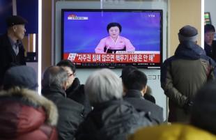 FILE - In this Wednesday, Jan. 6, 2016, file photo, people watch a TV news program showing North Korea's announcement, at the Seoul Railway Station in Seoul, South Korea. After ringing in the new year with claims of its first successful hydrogen bomb test, North Korea is now calling on the United States and the world community to accept it as a nuclear power, jettison the pursuit of punitive sanctions and allow it to focus on what it really wants: build up the nations troubled economy. (AP Photo/Ahn Young-joon, File)