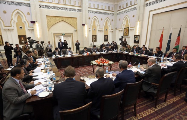 Delegations from Afghanistan, Pakistan, The United States of America and China discuss a road map for ending the war with the Taliban at the Presidential Palace in Kabul, Afghanistan, Monday, Jan. 18, 2016. Representatives of four countries met in the Afghan capital Kabul on Monday for a second round of talks aimed at bringing an end to Afghanistan's war by charting a roadmap to peace, a Foreign Ministry official said. (AP Photo/Rahmat Gul)