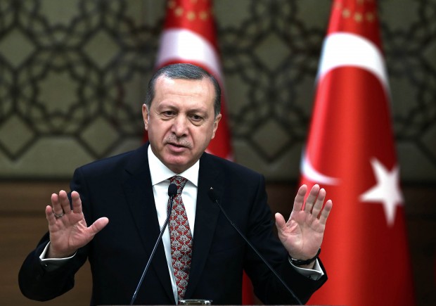 Turkish President Recep Tayyip Erdogan addresses a meeting of local administrators at his palace in Ankara, Turkey. (Yasin Bulbul/Presidential Press Service, Pool via AP)