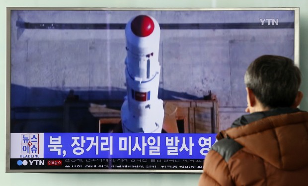 A man watches a television news program reporting about North Korea's recent rocket launch at the Seoul Train Station in Seoul, South Korea. (AP Photo/Lee Jin-man)