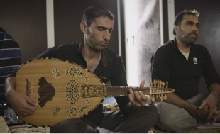 Two of Zaatari's camp musician's Mohammed and Abu Abdullah, as they perform one of their songs on immigration and life hardships. (youtube)