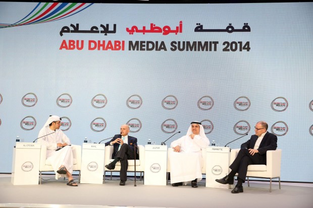 Participants discuss at the three-day Abu Dhabi media summit in Abu Dhabi, United Arab Emirates, Nov. 18, 2014. Queen Rania Abdullah of Jordan delivered a keynote speech here on Tuesday and said that the Arab world shall not allow IS terrorists to hijack the region's identity, but to encounter extremism through creating education, jobs and to retain the region's lead in global cyberspace growth. (Xinhua/An Jiang)