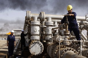 Plunging oil prices have pitched Iraq into a severe financial crisis as it struggles to combat the Islamic State group, play host to millions of refugees and rebuild cities and towns ravaged by war. With global prices hovering around $30 a barrel, Iraq has had to draw on foreign exchange reserves to fill a shortfall in the 2016 budget, which anticipated $45 per barrel.  (AP Photo/Nabil al-Jurani, File)