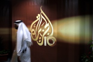 Al-Jazeera, the Qatar-based broadcaster, said Sunday, March 27, 2016 it is slashing about 500 jobs worldwide little more than two months after shutting its U.S. offshoot. (AP Photo/Kamran Jebreili, File)