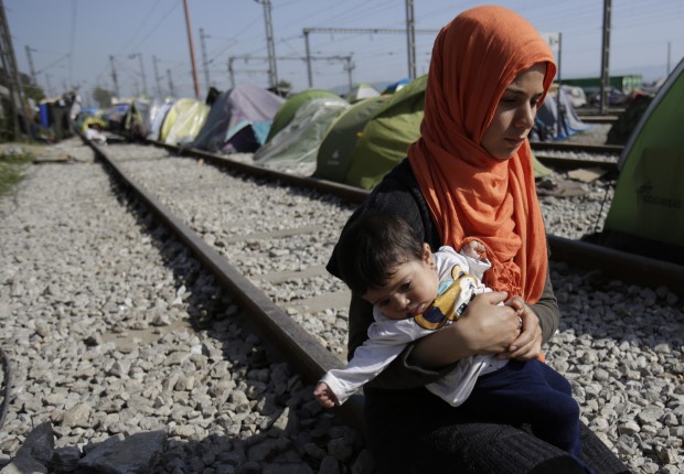 Migrants and refugees stranded in Idomeni, find shelter in train sleeping cars. About 11,000 migrants remain stuck in Idomeni, most of them for over a month, not knowing how to deal with the shut European borders. (AP Photo/Amel Emric)