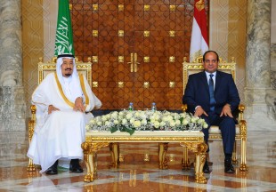 Egyptian President Abdel-Fattah el-Sissi, right, sits with Saudi Arabia's King Salman in Cairo.  Egypt welcomed Saudi Arabia's monarch on a landmark visit to the Arab world's most populous country on Thursday, with Cairo seeking to boost ties and garner deals to prop up the nation's shaky economy despite some persistent divisions with the Sunni powerhouse. (Fady Faris, Egyptian Presidency via AP)