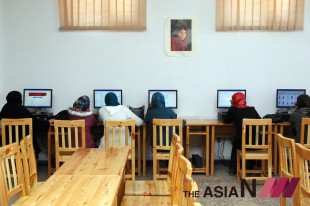 Female students using the internet at Herat University in the western Afghan city of Herat.