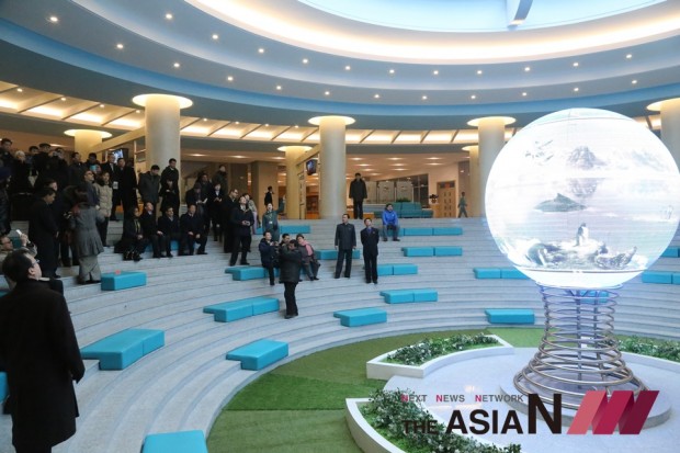 Citizens watch an illuminated model of a globe at the Sci-Tech Complex in Pyongyang, capital of the Democratic People's Republic of Korea (DPRK), Feb. 3, 2016. (Photo : Xinhua)