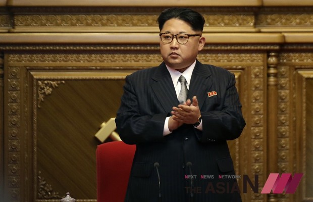 North Korean leader Kim Jong Un arrives for the party congress while party representatives applaud in the foreground in Pyongyang, North Korea, Monday, May 9, 2016. North Korea has brought in more than 100 journalists from around the world to make sure that the 7th Congress of its ruling Workers' Party gets global attention. Four days into the event, they allowed a small number of foreign journalists into the conventional hall where the congress was taking place. (Photo : AP)