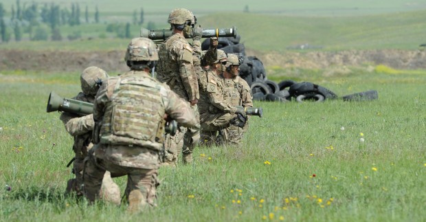 (160514) -- TBILISI, May 14, 2016 (Xinhua) -- Soldiers of Georgia, U.S. and UK participate in the joint military exercises named "Noble Partner 2016" at Vaziani base near Tbilisi in Georgia, May 14, 2016. Georgia announced the three-week long military drill named "Noble Partner 2016" with U.S. and UK at the Vaziani base near its capital Tbilisi on May 11. The drill will last until May 26. (Xinhua/Lasha Kuprashvili)