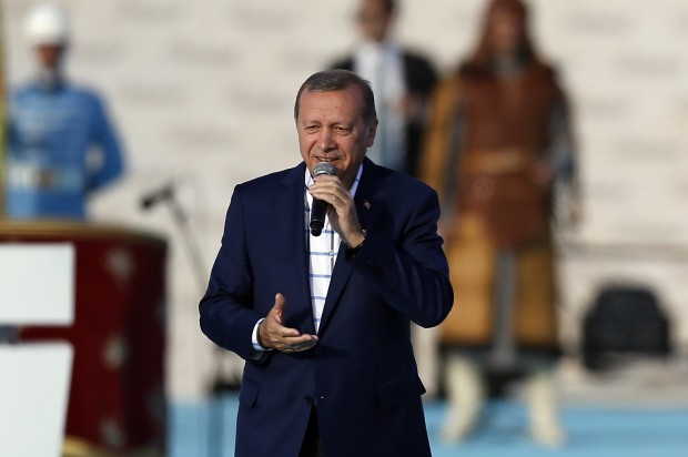 Turkey's President Recep Tayyip Erdogan addresses a rally marking the 563rd anniversary of the Ottoman conquest of Istanbul -  formerly Constantinople - in Istanbul, Turkey, Sunday, May 29, 2016. Erdogan has criticized the United States, Russia and Iran for their presence in Syria and said their unwillingness to depose Syrian President Bashar Assad was contributing to Syrian peoples' massacre and pain.(AP Photo/Emrah Gurel)