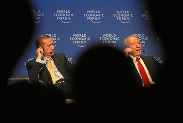 DAVOS, Jan. 31, 2009 (Xinhua) -- Turkey's former Prime Minister and current president Tayyip Erdogan (L) and Israel's President Shimon Peres attend a session at the World Economic Forum in Davos, Switzerland, on Jan. 29, 2009. Recep Tayyip Erdogan on Thursday stormed out of a debate hall on the Gaza situation at the World Economic Forum annual meeting in Davos. Erdogan complained that he was not given enough time to respond to what Shimon Peres said. (Xinhua/swiss-image)