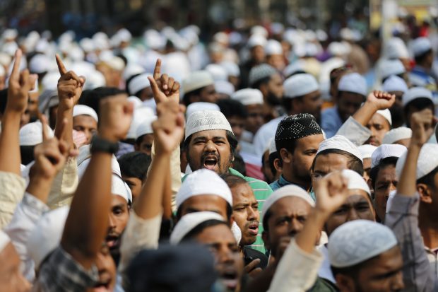 Bangladeshi activists of several Islamic groups march in a protest rally against the persecution of Rohingya Muslims in Myanmar, after Friday prayers in Dhaka, Bangladesh, Nov. 25, 2016. Chanting "Stop killing Rohingya Muslims," they marched in Dhaka amid tight security Friday as the violence in Myanmar's Rakhine state escalated, forcing thousands to leave their homes. (AP Photo/A.M. Ahad)