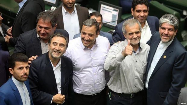 Head of the newly created Turkic faction Masoud Pezeshkian (second on the right) surrounded by other MPs in the Iranian parliament.