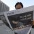 A man reads an extra edition of a newspaper reporting about impeached President Park Geun-hye in Seoul, South Korea, Friday, March 10, 2017. In a historic, unanimous ruling Friday, South Korea's Constitutional Court formally removed impeached President Park Geun-hye from office over a corruption scandal that has plunged the country into political turmoil and worsened an already-serious national divide. (AP Photo/Lee Jin-man)