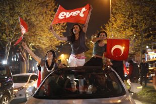 Supporters of the Erdogan administration celebrate the referendum result.