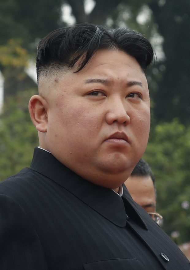  North Korean leader Kim Jong Un attends a wreath laying ceremony at Monument to War Heroes and Martyrs in Hanoi, Vietnam Saturday, March 2, 2019. (Kham/Pool Photo via AP)/2019-03-02 13:37:18/ 