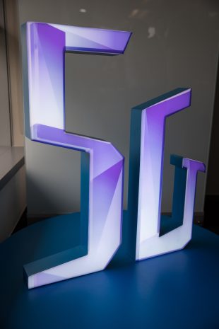 epa07511732 A 5G logo is displayed in China Mobile Hong Kong Co., Ltd., a new open laboratory in Hong Kong, China, 17 April 2019. The Hong Kong Open Lab of China Mobile Group's 5G Joint Innovation Center was moved from its former site to the Hong Kong Science Park where it can accommodate more advanced equipment, allowing local businesses to conduct R&D tests on 5G network applications.  EPA/JEROME FAVRE