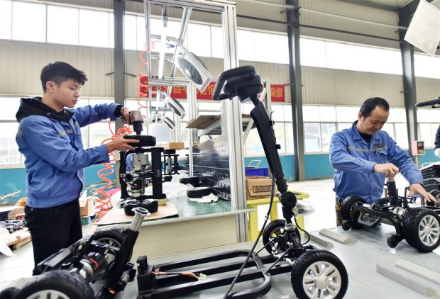 On November 21, 2018, Jiangxi Special Electric Co., Ltd. of Yichun City, Jiangxi Province, the staff was stepping up the production of electric scooters to Europe, the Middle East and other places. (Photo by Zhou Liang and Liu Jigang from People’s Daily Online)