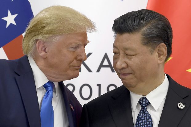  President Donald Trump, left, meets with Chinese President Xi Jinping during a meeting on the sidelines of the G-20 summit in Osaka, Japan, Saturday, June 29, 2019. (AP Photo/Susan Walsh)/2019-06-29 12:20:47/ 