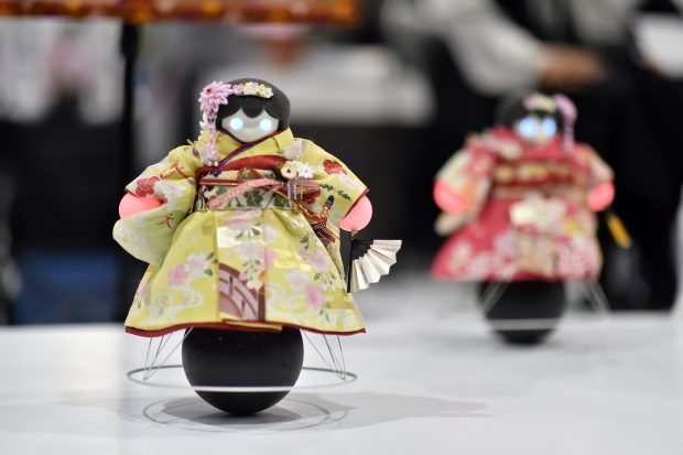 Cute robots dressed in traditional Japanese kimonos dance during the G20 Summit expo in Osaka, Japan, 27 June 2019. Osaka hosted the G20 Summit on June 28 and 29, and welcomed leaders from 37 countries and international organizations. On February 4, just 150 days before this historical event, the Kansai Promotion Council for the 2019 G20 Osaka Summit and the Osaka Convention & Tourism Bureau co-sponsored the "G20 Osaka Summit Forum" in Osaka. The event attracted approximately 500 people from the local communities in Osaka.