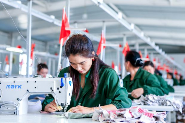 Women of Uygur ethnic group work at a workshop of a clothing factory in a village of Aksu prefecture, northwest China’s Xinjiang Uyghur Autonomous Region, May 10, 2019. The average monthly income of the workers at the factory stands at over 2,000 yuan. By Yu Liudong, People’s Daily