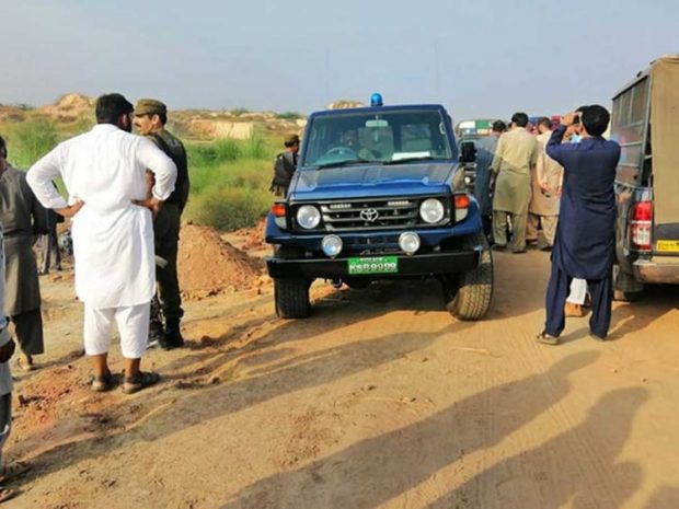 Police officers, people gather at the spot where remains were discovered (Social media)