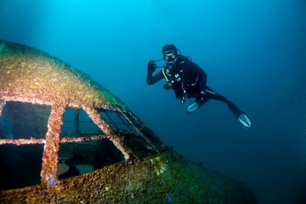Diver next to the Boeing 747, located 20-22 meters below the water 
