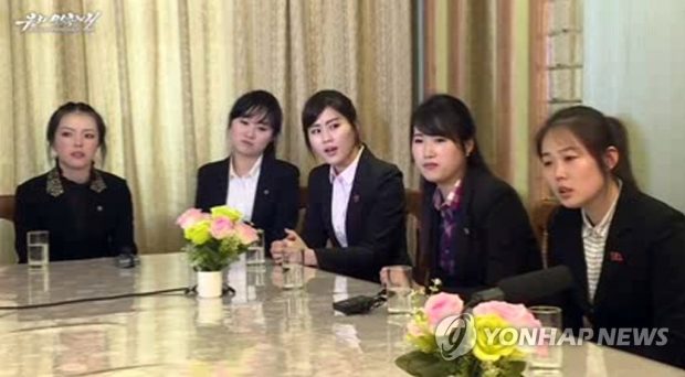 This file photo shows a group of North Korean women identified as coworkers of 13 restaurant workers who defected to South Korea earlier (Yonhap)