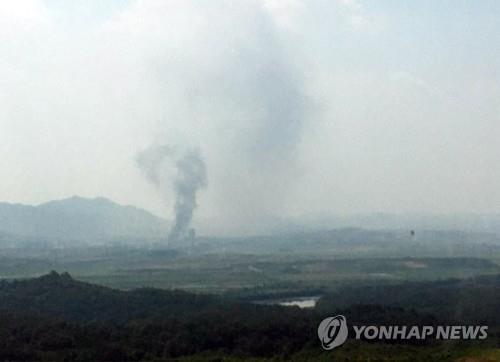 Smoke rises from North Korea's border town of Kaesong on June 16, 2020, as North Korea, according to the unification ministry, blew up the inter-Korean liaison office there in protest over South Korean activists' anti-regime leaflet campaign, in this photo provided by a Yonhap reader. (Yonhap)