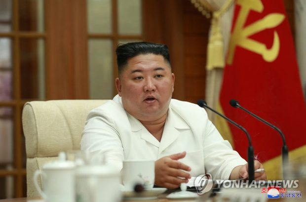 North Korean leader Kim Jong-un presides over an enlarged meeting of the political bureau of the Workers' Party's central committee in Pyongyang (Yonhap)