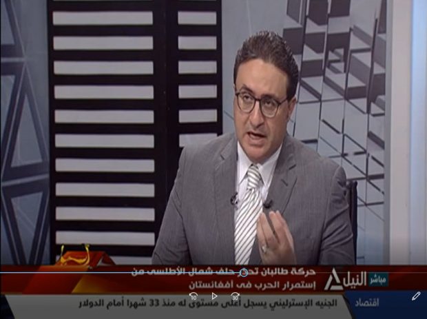 Tamer Hanafi interviewing Ashraf Aboul-Yazid for Nile TV