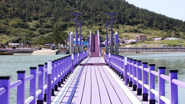 The purple bridge was fixed up and repainted in early 2020. Courtesy of Shinan County Office