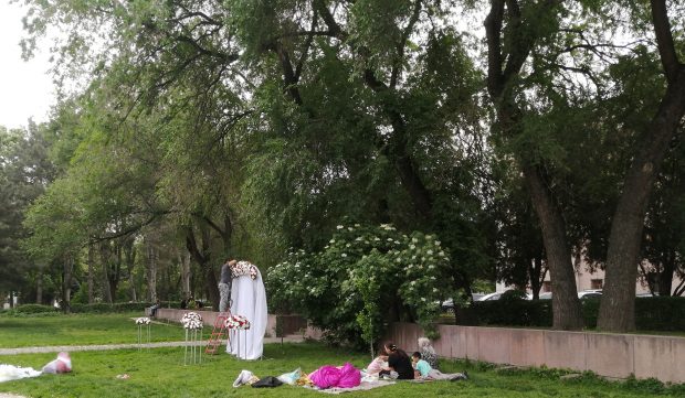 A family enjoying the clement weather in a Bishkek park