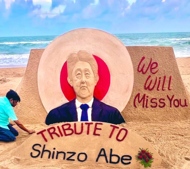  Sudarsan Pattnaik @sudarsansand · Jul 8 Deeply saddened to know about the demise of former Japanese PM #ShinzoAbe. He was a great friend of India and played a key role in strengthening the Indo-Japan bond. My sand art at Puri beach in India with message “We will miss you “Tribute to #Shinzo Abe . India in Japanインド大使館 and Embassy of Japan in India