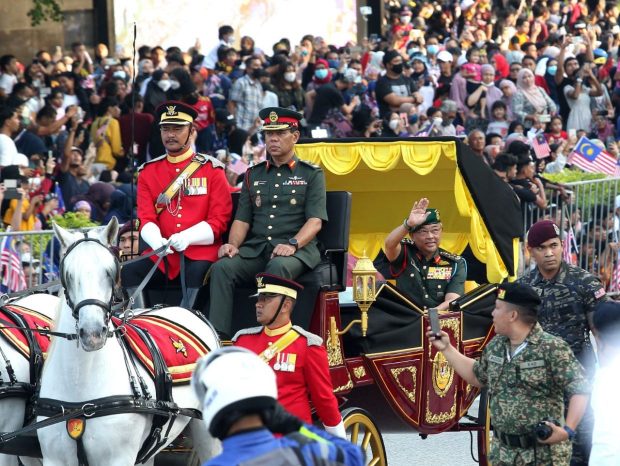 Malaysia's King, Queen as they arrive arrived in a horse-drawn carriage to grace the National Day 2022 celebrations at Dataran Merdeka.