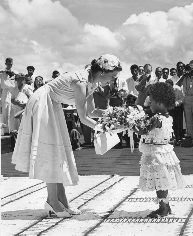 3. The Queen is received and greeted by a little girl with flowers (Khartoum, Sudan, February, 1965)