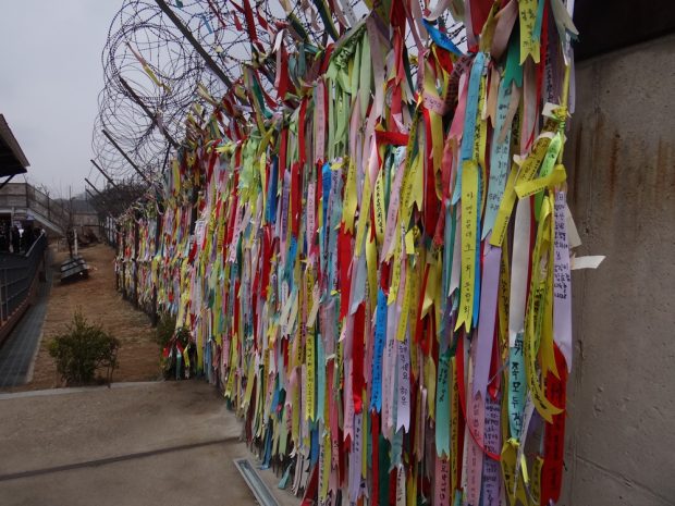 Ribbions for peace hanging on a fence at the DMZ