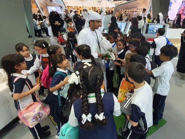 School children learning about the falcon at ADIHEX 2023